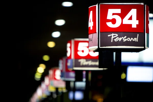 Illuminated gates at the main bus station at night in Buenos Air — Stock Photo, Image