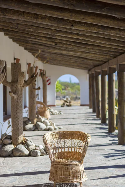 Empty wicker chair located in the patio with sunrise light, Arge — Stock Photo, Image