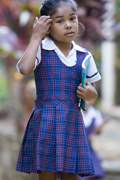 Cute young student girl with a book and a pencil — Stock Photo, Image