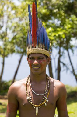 Handsome Brazilian indian man from tribe in Amazon, Brazil clipart