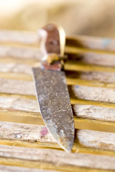 Old table knife on wooden background, Brazil — Stock Photo, Image