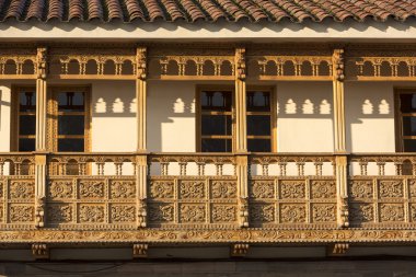Colonial rustic wooden balconies in Cusco, Peru