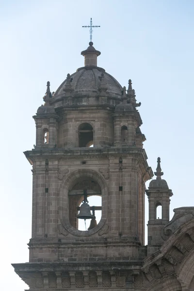 Tower and dome of the historic Iglesia de la Compania in Cusco Stock Image