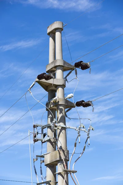Concrete electrical line tower during sunny day, Uruguay — Stok fotoğraf