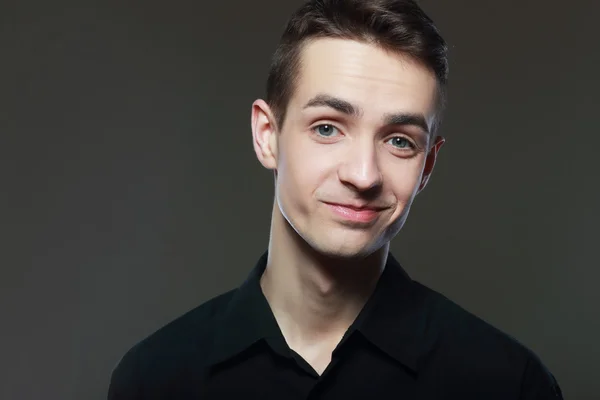 Young man face smiling — Stock Photo, Image