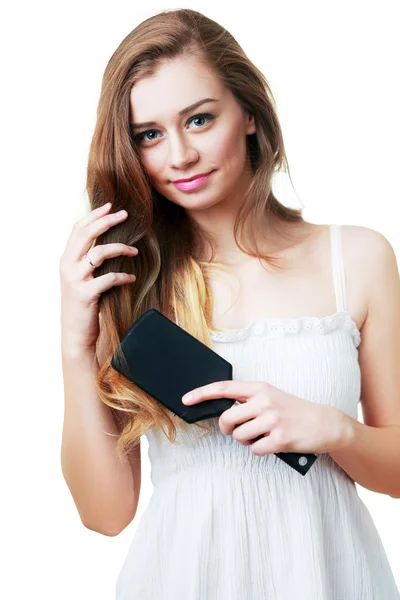 Mujer peinándose el pelo — Foto de Stock