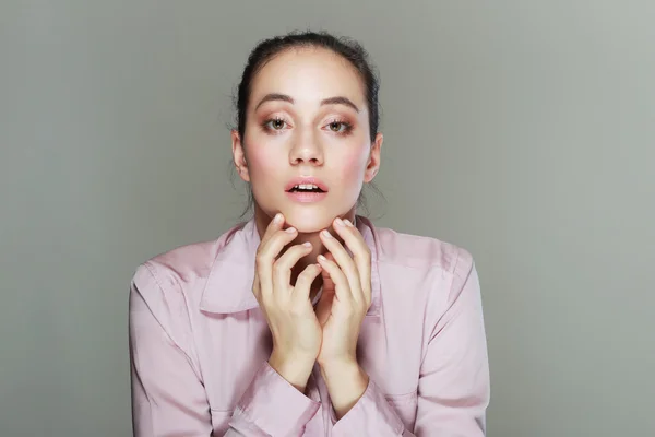 Businesswoman with open mouth and open palms — Stock Photo, Image