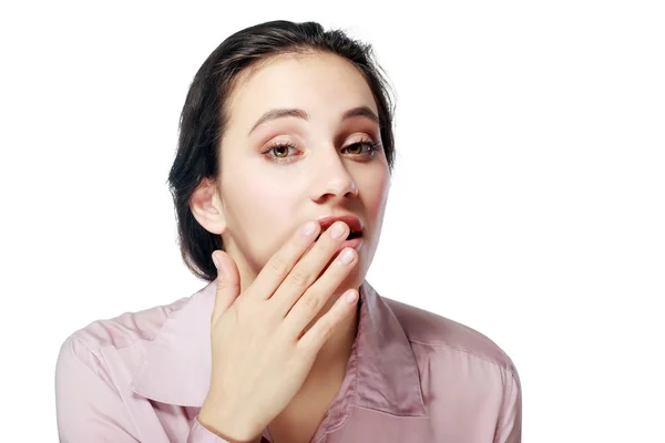 Shocked girl covers her mouth Stock Photo