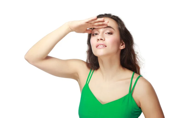 Mujer sombreando sus ojos — Foto de Stock