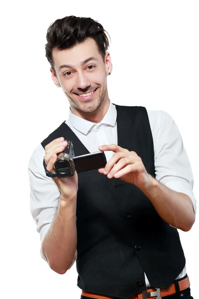 Homem segurando uma câmera de vídeo HD — Fotografia de Stock