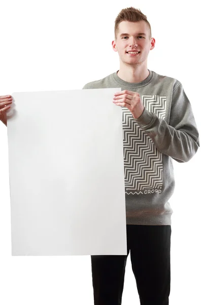 Man holding big white blank — Stock Photo, Image