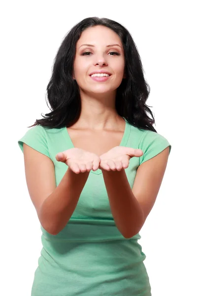 Woman holding something in her hands — Stock Photo, Image