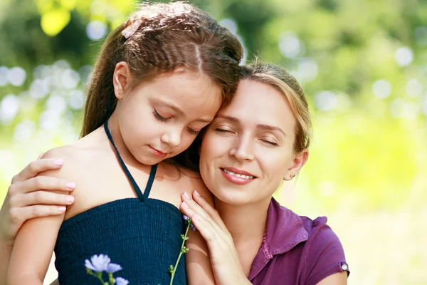 Mother and little daughter on nature — Stock Photo, Image