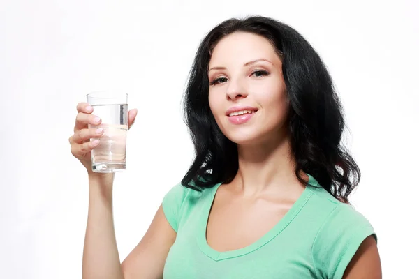 Woman holds glass of water — Stock Photo, Image