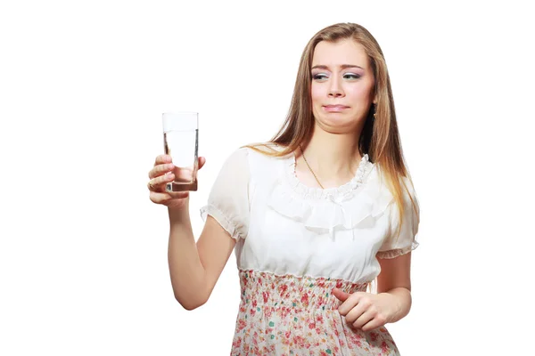 Woman looking disgusted at water — Stock Photo, Image