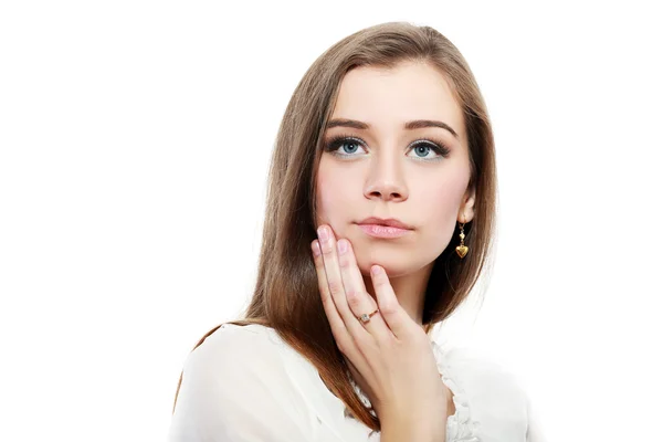 Woman with hands on her chin — Stock Photo, Image