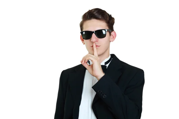 Man in tuxedo sign for quiet — Stock Photo, Image