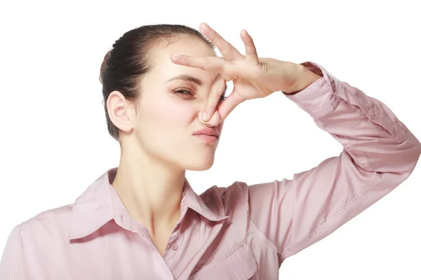 Jonge vrouw met haar neus — Stockfoto