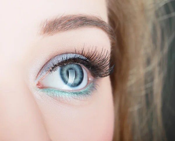 Green beautiful womanish eye — Stock Photo, Image