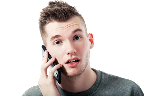 Surprised  man talking on mobile — Stock Photo, Image