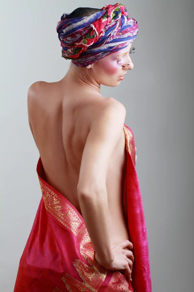 Turban and with artistic visage — Stock Photo, Image