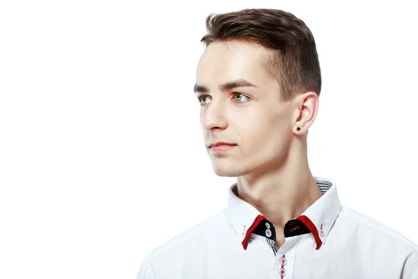 Attractive young man looking sideways — Stock Photo, Image