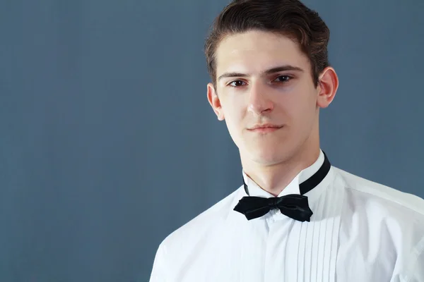 Man in a shirt and bow tie — Stock Photo, Image