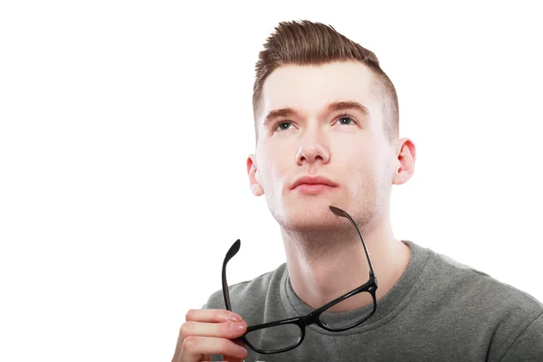 Man  thinking holding glasses — Stock Photo, Image