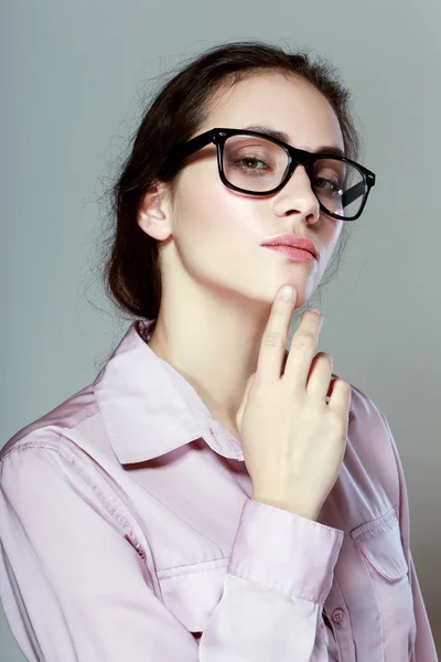 Serious businesswoman with eyeglasses — Stock Photo, Image