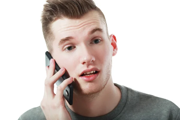 Mann som snakker til mobiltelefon – stockfoto