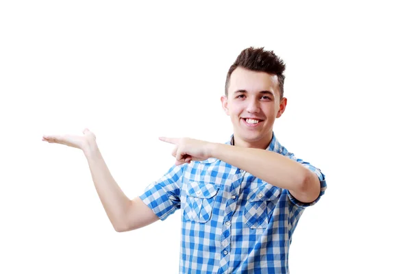 Young man presenting something — Stock Photo, Image