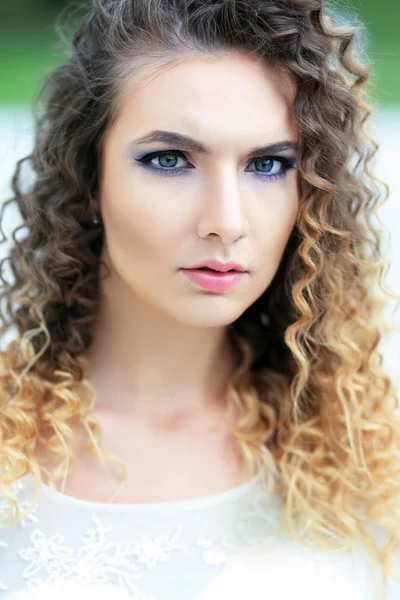 Beautiful bride with curly hair — Stock Photo, Image