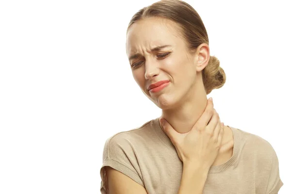 Portrait Woman Holding Her Throat Feeling Increated White Background — Stok Foto