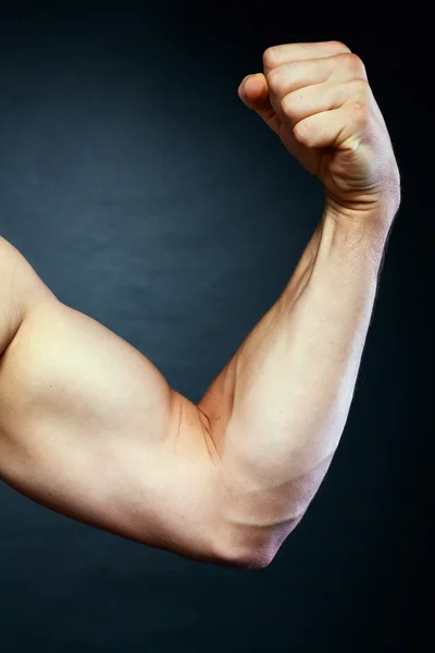 Muscular hand close up — Stock Photo, Image