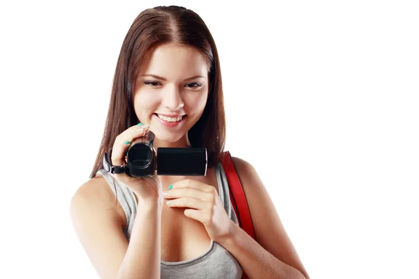 Frau schaut auf Videokamera — Stockfoto