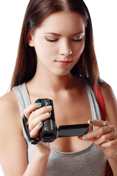 Woman looking at videocamera — Stock Photo, Image