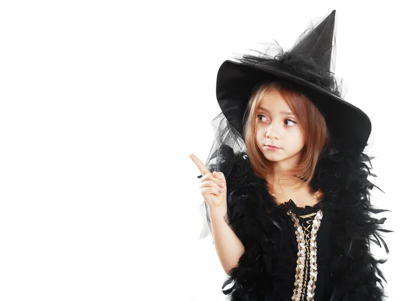 Meisje in witch halloween kostuum — Stockfoto