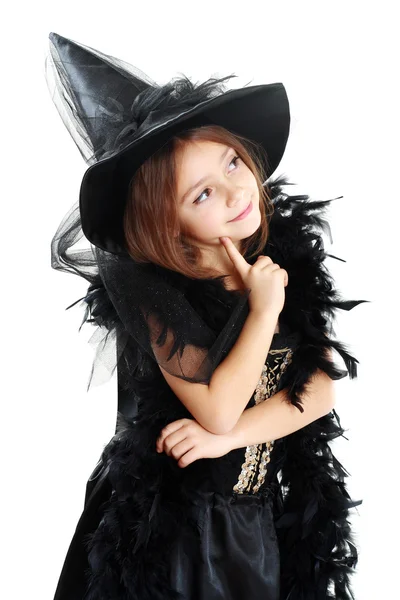 Meisje in witch halloween kostuum — Stockfoto