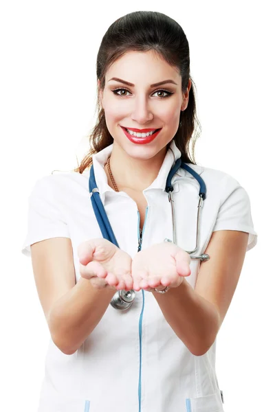 Medico donna con qualcosa in mano — Foto Stock