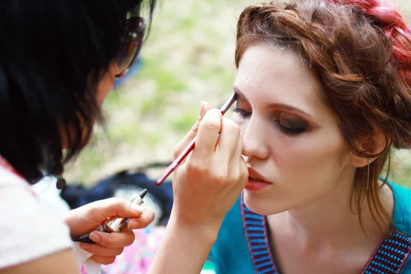 Make-up artist and model outdoor