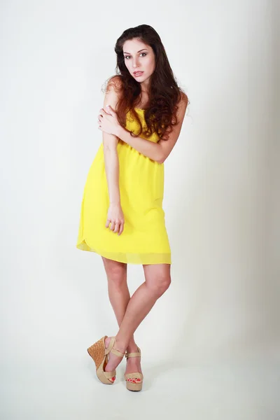 Fashion model in  yellow dress — Stock Photo, Image