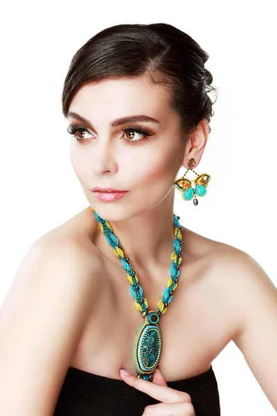 Woman wearing earrings — Stock Photo, Image