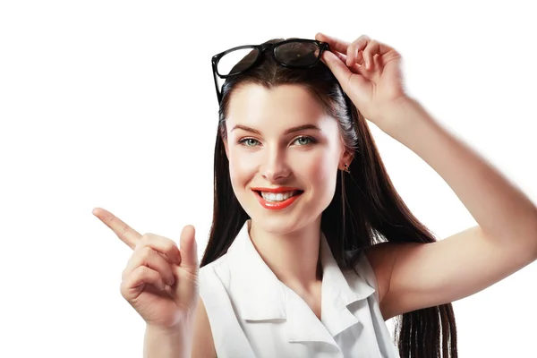 Woman with her finger pointing to copyspace — Stock Photo, Image