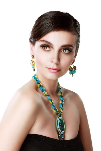 Woman wearing earrings — Stock Photo, Image