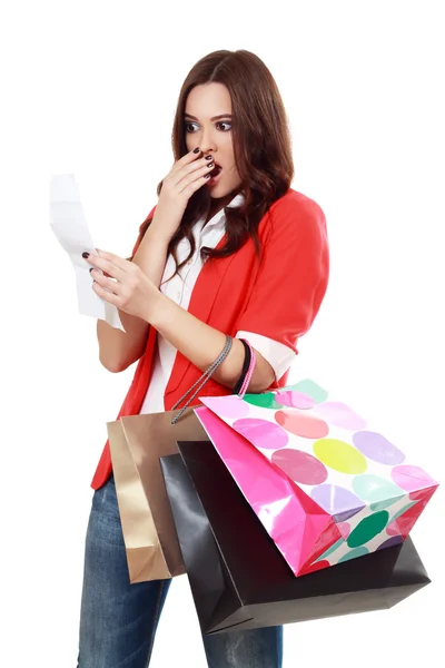 Mujer mirando su recibo — Foto de Stock