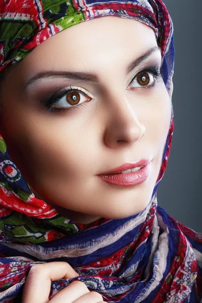 Arabic woman wearing head scarf Stock Image