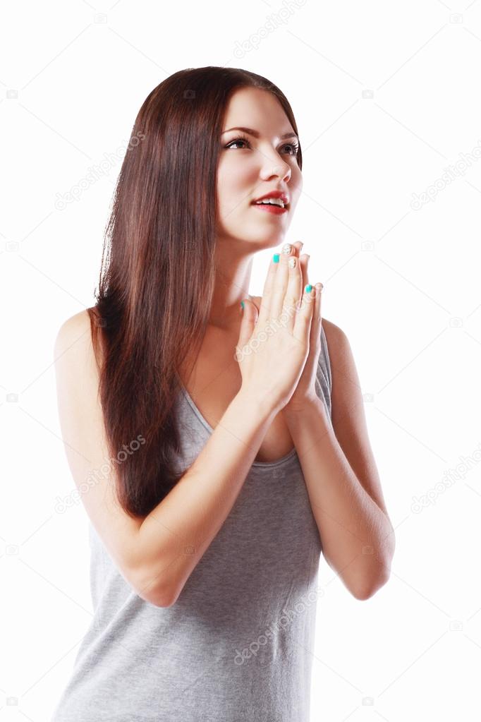 woman praying with her hands