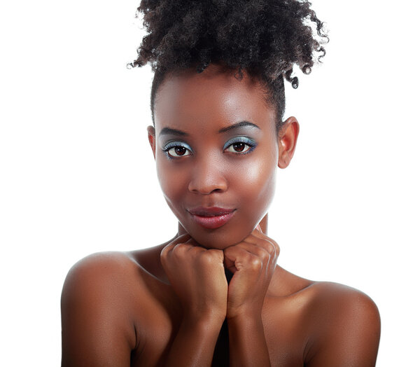 Beautiful black woman posing in a studio