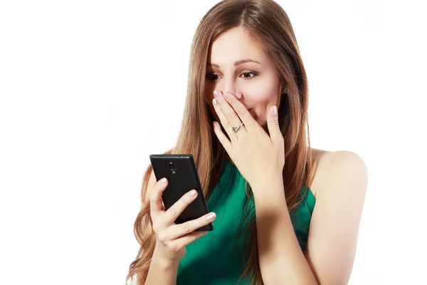 Upset young woman with cell phone — Stockfoto