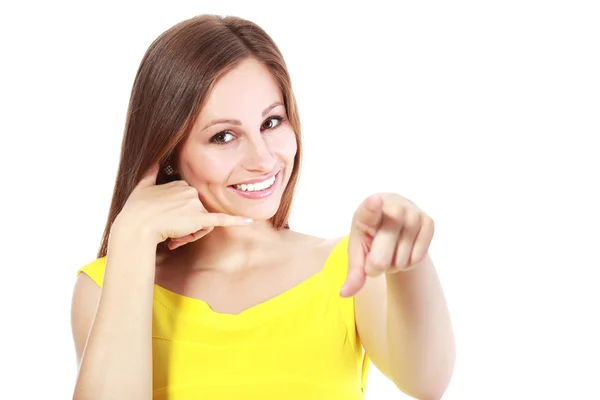 Woman showing call me gesture — Stock Photo, Image